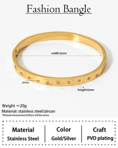 Macro detail showing technical dimensions and gold stainless steel pavé bangle texture
