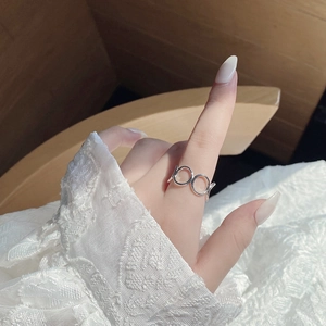 Minimalist double circle S925 sterling silver open ring on white lace background