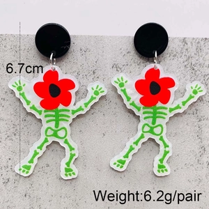 Detail view of acrylic skeleton earrings with red flower head showing 6.7cm height