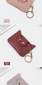 Detail of cartoon cat leather card holder with gold keychain in various colors