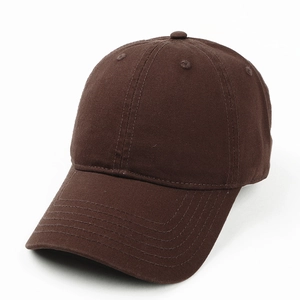 Detail view of a classic brown six-panel cotton baseball cap with a curved brim