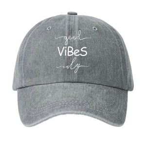 Grey washed cotton baseball cap with white Good Vibes Only slogan in vintage style