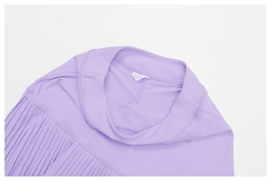 Close-up of lilac pleated sports skirt featuring breathable mesh lining and seamless waistband