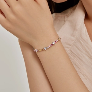 Elegant S925 sterling silver heart tennis bracelet with colorful zircon stones on wrist