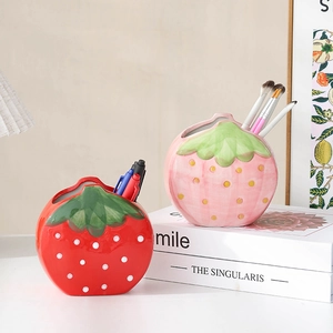 Cute strawberry ceramic pen holder and makeup brush organizer in red and pink colors