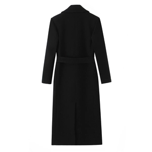 Back view of a long black wool blend coat with waist belt and slit hem on white background