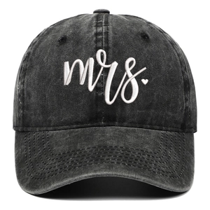 Detailed view of washed black cotton baseball cap with white 3D Mrs. embroidery and heart