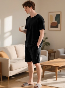 Relaxed fit black short sleeve t-shirt and shorts lounge set for men in living room