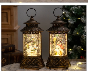 Close-up of vintage bronze Christmas lanterns with LED lights and swirling snow effect