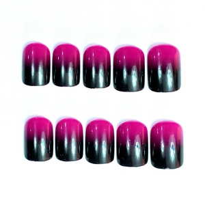 Detail showing gradient fuchsia to black press-on nails in short square shape