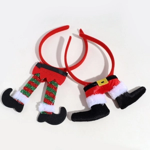 Detail of Christmas headbands featuring elf legs and Santa trousers with plush trim