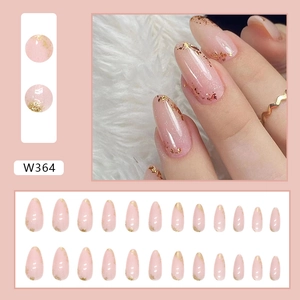 Pink almond press-on nails with gold foil accents and set of 24 pieces for manicures