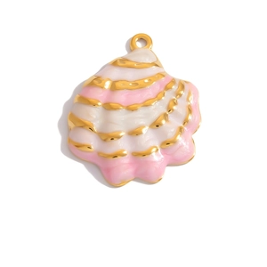 Detail view of pink and off-white shell pendant with gold plating and enamel finish