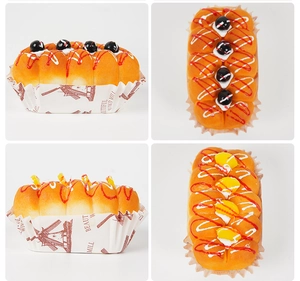 Detailed views of PU slow-rebound artificial cupcake models with jam and cherry toppings