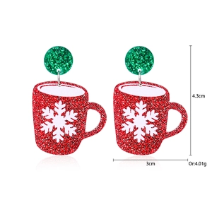 Detailed view of red and green glitter Christmas mug earrings with 4.3cm x 3cm dimensions
