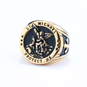 Mens stainless steel Saint Michael signet ring with gold and black embossed detail