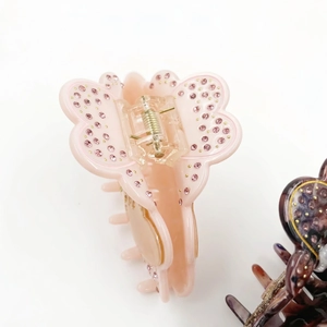 Pink acetate butterfly hair claw clip with sparkling rhinestones for women's hairstyle