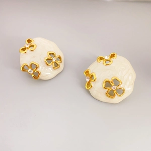 French vintage style hollow flower earrings with white enamel and sparkling crystals