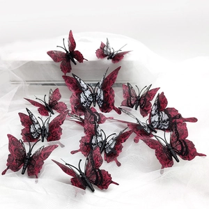 Detailed close-up of 3D Halloween butterflies featuring skull and red rose wing patterns