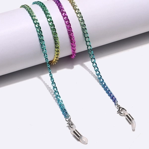 Colorful copper chain for glasses and masks with lobster clasps on white stands