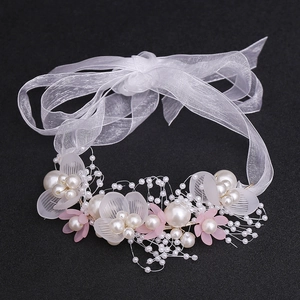 Handmade flower headband with white pearls, pink petals and organza ribbon for girls