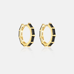 Detail of 925 silver gold-plated hoop earrings with black rectangle-cut zircon stones
