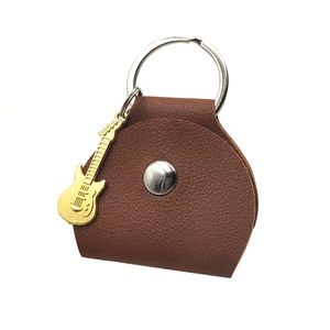 Brown leather guitar pick case keychain with electric guitar pendant and metal clasp