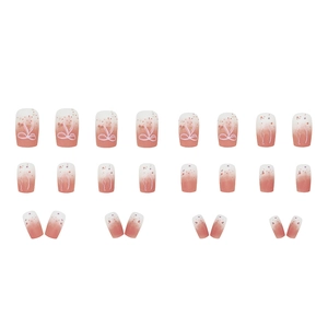 Pink gradient short square press-on nails with white bow designs and glitter