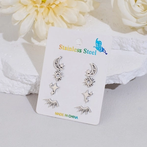 Set of 4 stainless steel stud earrings featuring moon, star and sun geometric designs