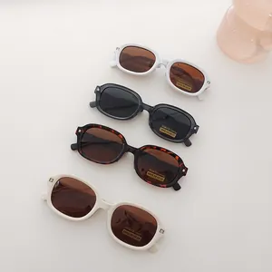 Macro shot of stylish folding polarized sunglasses with reinforced hinges in four colors