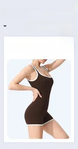 Brown ribbed bodysuit with white piping and U-neck for yoga and fitness training