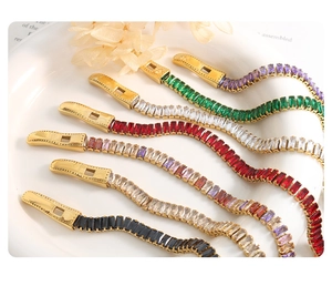 Macro shot of 18k gold plated tennis bracelets with colorful rectangular cubic zirconia stones