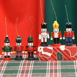 Set of 6 mini wooden Christmas nutcracker hanging ornaments with gold strings