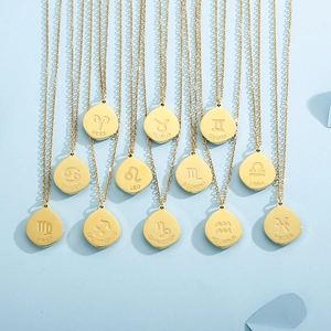 Golden zodiac necklace set with malachite drop pendants and 12 constellation symbols