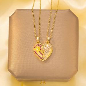 Magnetic heart split necklace for best friends with pink rhinestones and gold plating