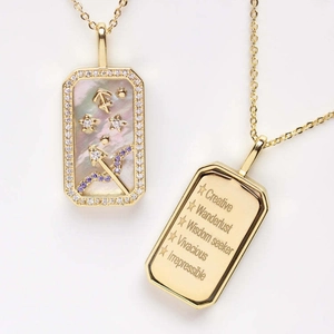 Detailed macro view of Sagittarius pendant with purple zircon and engraved artistic words