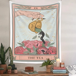 Close-up of The Tea Tarot tapestry with IX Roman numeral hanging above a cozy wooden shelf