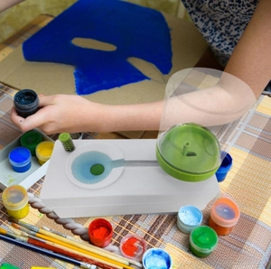 Close-up of painting set including multiple colors and professional paint brushes for DIY