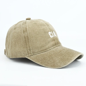 Detailed side view of khaki washed cotton baseball cap with white CIA letter embroidery