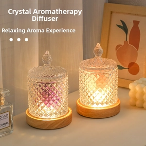 Detail view of crystal diffuser stone glass jar on warm glowing wood base for bedroom