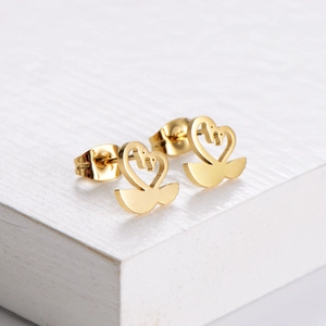 Polished golden swan earrings made of titanium steel with a minimalist hollow design