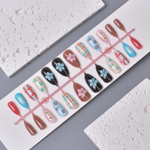 3D floral and plaid almond press-on nails set with 24 pieces in various artistic designs
