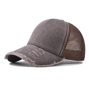 Vintage washed charcoal and brown mesh trucker hat with distressed ripped detailing
