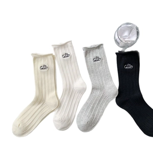 Set of four ribbed mid-calf socks with cute cat embroidery and wavy cuffs in neutral colors