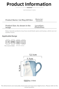 Detail view of a 310ml light blue ceramic cat mug with 3D embossed heart and gift box