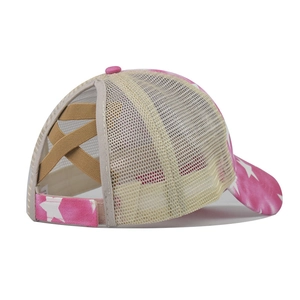 Detail of cross elastic bands on a ponytail baseball cap with star pattern