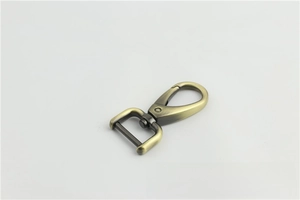 Close-up of antique bronze metal lobster clasp for bags with durable threaded screw rod