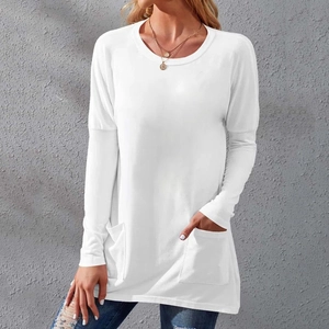 Detailed close-up of white crewneck T-shirt featuring functional side pockets and soft fabric