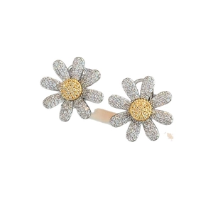 Sparkling daisy flower stud earrings with zirconia stones in silver and yellow finish