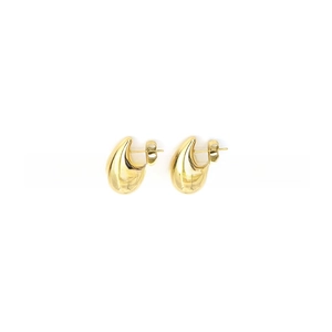 Macro shot of 18K gold plated teardrop stud earrings with polished mirror finish